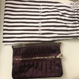 Henri Bendel clutch - in dark purple